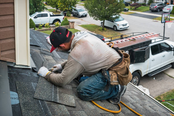 Professional Roofing technician working in Port Jefferson, NY